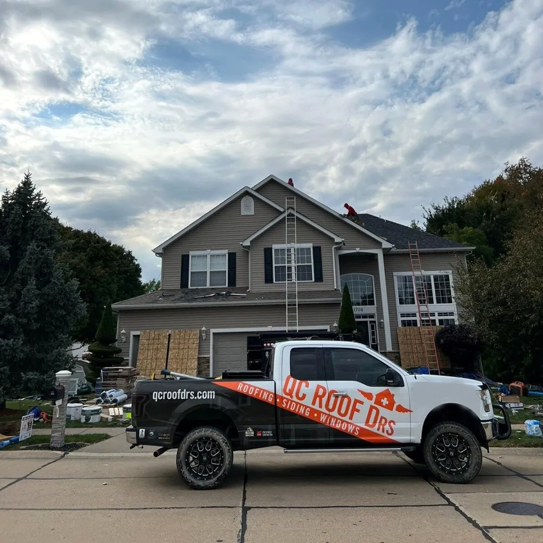 Roof Drs branded truck at an active residential roofing project